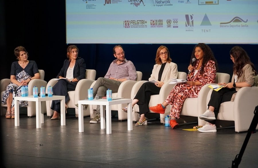 Kudwa founder moderating a panl in the Spain forum for Refugees hosted by UNHCR